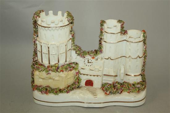 Five Staffordshire porcelain models of cottages and a castle, c.1840, 13.5 - 14cm